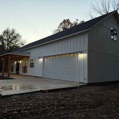White farmhouse · metal roof